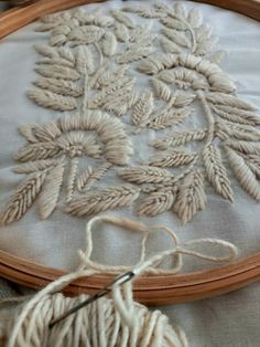 a close up of a embroidery on a table