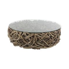 a glass and wicker bowl on a white background