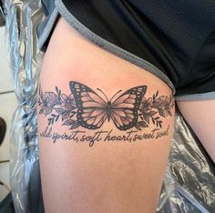 a woman's thigh with a butterfly tattoo on it and the words, you are beautiful