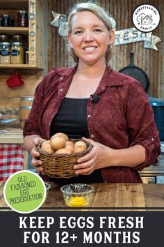 a woman holding a basket full of eggs on top of a wooden table with the words keep eggs fresh for 12 - months