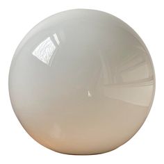 a large white ball sitting on top of a table