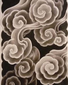 black and white drawing of flowers with swirls in the middle, on a gray background