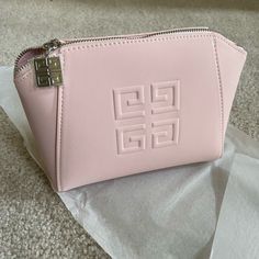 Super Cute Pale Pink Givenchy Pouch With A Stylish Zipper. Brand New Never Used. Comes With Box. Super Cute Elegant Pink Compact Bag, Elegant Compact Pink Bag, Modern Evening Cosmetic Bag, Elegant Pink Pouch Cosmetic Bag, Elegant Cosmetic Bag With Dust Bag, School Pouch, Givenchy Bags, Pink Pouch, Givenchy Bag