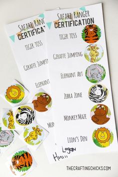 some stickers that are on top of a white surface with the words safari ranger certificate