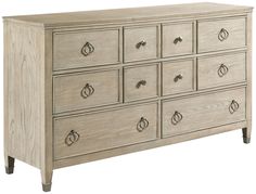 a large wooden dresser with many drawers