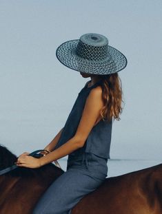 Carlota Straw Hat in Baby Blue + Navy Blue from Van Palma 100% Toquilla adjourned Straw Hat 12 cm width Handwoven in Ecuador Made in France 🇫🇷 56-S / 57-M / 58-L Since 2014, French brand Van Palma has been breathing new life into the accessories aisle with its elegant year-round hat collections. At the helm of this sunny, California-inspired label is Victoria Sanguinetti, a young designer from Marseille who decided to follow her passion rather than her business degree. Chic Blue Straw Hat For The Beach, Chic Blue Beach Hat, Blue Flat Brim Hat For The Beach, Blue Flat Brim Hat For Summer, Spring Beach Hat In Blue, Blue Panama Hat With Curved Brim For Beach, Blue Summer Hat With Short Brim, Blue Flat Brim Hat For Vacation, Blue Panama Hat For Beach With Curved Brim