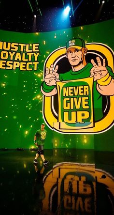 a man standing in front of a green and yellow backdrop that says hustle royalty expert never give up