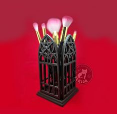 ♥ 𝘼𝘽𝙊𝙐𝙏 𝙏𝙃𝙀 𝙋𝙍𝙊𝘿𝙐𝘾𝙏 Made-to-order brush holder with a gothic window design to hold your brushes, pencils or what ever you need to store in it! Made from high quality locally produced PLA plastic on a 3D printer. Choose from different colours and finishes.  With a pentagram design 150mm Tall x 80 mm Wide 5.9 inch x 3.1 inch Wide ► 𝙂𝙇𝙄𝙏𝙏𝙀𝙍 𝘾𝙊𝘼𝙏𝙄𝙉𝙂 This option means that we put a glitter coating over the product to make it nice and sparkly. ✉ 𝙎𝙃𝙄𝙋𝙋𝙄𝙉𝙂 We know th Gothic Window Design, Gothic Window, Witchy Home, Pentagram Design, Gothic Windows, Witchy Home Decor, Halloween Spooky, Brush Holder, Window Design