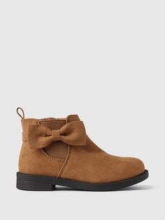 These boots are made with a vegan suede upper.  Rubber gripper sole.  Zipper at ankle.  Bow at ankle.  For more fit and sizing info, check out our Size Guide. Orange Aesthetic Fashion, Toddler Fall Dress, Toddler Fall Fashion, Fall Fashion Boots, Boots Cognac, Holiday 2024, Toddler Fall, Tree Farm