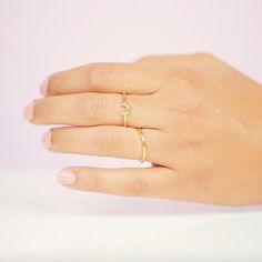 The Moon ring is the perfect dainty gold ring to wear alone or stacked with others. Adding a bohemian touch to your minimalist jewelry look. 18k gold plating over a brass base Available in size 6, 7 and 8 Handmade in America