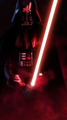 darth vader in the dark with red light coming from his helmet and lights up