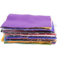 a stack of multicolored fabric on a white background