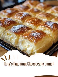 a close up of some bread on a pan with the words king's hawaiian cheesecake danish