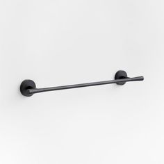 an image of a black towel bar on the wall