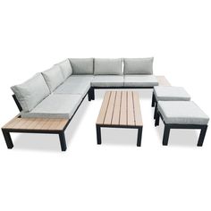 an outdoor sectional couch with wooden tables and pillows on the back, in front of a white background