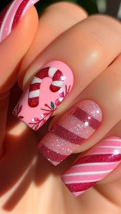 I'm absolutely loving the pink nail trend this Christmas! It's the perfect mix of playful and elegant. What do you think of this look? Share your thoughts in the comments below about this gorgeous pink Christmas nail design! Girlie Christmas Nails, Fancy Christmas Nail Designs, Funky Christmas Nails Design, Bright Pink Christmas Nails, Short Christmas Nails Acrylic, Red And Pink Christmas Nails, Baby Pink Christmas Nails, Xmas Nails Pink, Christmas Nails Design Elegant