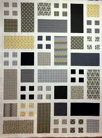 a quilt made with squares and other patterns on it's sides, all in different colors