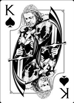 the king of spades playing card with an image of two lions on each side