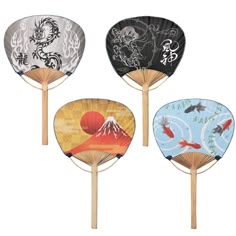 four hand fans with designs on them