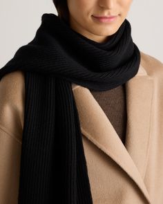 Ready to bundle up this season? Look no further than the Merino Wool Fisherman Scarf. Crafted from 100% merino wool, this scarf will keep you warm in the chilliest weather while giving your outfit a cozy finishing touch.  | Quince | Women's Merino Wool Fisherman Scarf in Black Classic Wool Scarves For Cold Weather, Casual Black Wool Scarf, Casual Black Warm Scarves, Casual Warm Black Scarves, Casual Warm Black Scarf, Casual Black Warm Scarf, Black Winter Scarves For Cold Weather, Warm Black Scarves For Fall, Warm Black Scarf For Fall