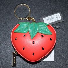 Kate Spade Strawberry Dreams Leather Coin Purse. New With Tag. Leather Material. Inside Is Lined With Logo. Zipper Top. With Chain And Clip Ring. Approximately 3 Inches In Height Nd 3.56 Inches In Width. Retails For $129. Sold Out. Kate Spade Strawberry, Top With Chain, Green Aquamarine, Leather Coin Purse, Handbag Charms, Kate Spade Wallet, Zipper Top, Kate Spade Bag