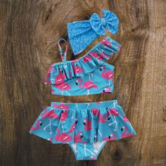 We suggest pairing this swimsuit with our Wave Pool bow! *Please note the suggested bow is not apart of the set but is available for purchase separately.*