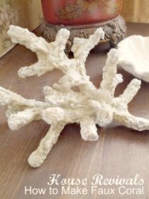 some white corals sitting on top of a wooden table