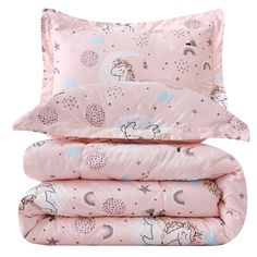 three pink sheets with unicorns and stars are stacked up on top of each other