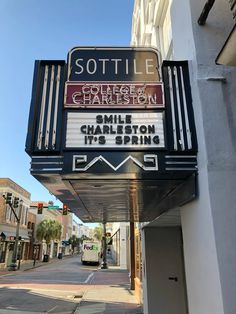 an old theater marquee sign on the side of a building in charleston, ga