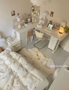 a bedroom with a bed and desk in it