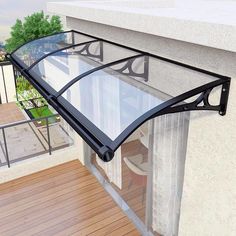 an image of a balcony with glass railing