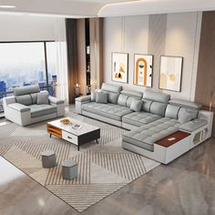 a living room with couches and tables in front of large windows overlooking the city