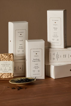 several different types of teas and boxes on a table