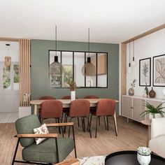 a living room filled with furniture next to a dining room table and chairs on top of a hard wood floor