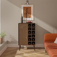 a living room with an orange couch and wine rack in the corner, next to a painting on the wall