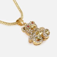 Discover the perfect blend of style and durability with our Teddy Bear 1½" Pendant with Chain Necklace, crafted from high-quality 18K gold plated stainless steel. Whether you're celebrating a victory on the field or making a fashion statement off it, this necklace is designed to complement your sporty lifestyle. With a polished finish that resists rust and tarnishing from sweat or water, it’s made to last through every challenge. This versatile necklace features a charming teddy bear pendant, of Gold Rope Chain Jewelry For Streetwear, Gold Rope Chain Jewelry, Gold Jewelry For Streetwear, Gold Metal Necklaces For Streetwear, Gold Adjustable Chain Necklace For Streetwear, Gold Chain Necklace With Adjustable Chain For Streetwear, Gold Necklace With Adjustable Chain For Streetwear, Teddy Bear Pendant, Sporty Lifestyle