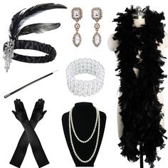 black and white accessories are displayed on a mannequin headdress, necklaces, bracelets, and gloves