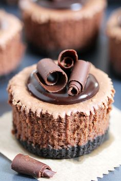 chocolate cupcakes with chocolate frosting on top