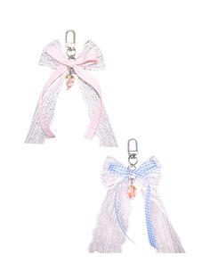 two white bows with pink and blue ribbons on them, one tied to the side