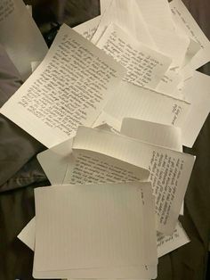 several pieces of paper with writing on them