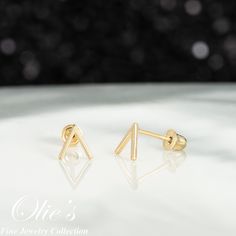 Go minimal with these triangle-shaped stud earrings. Choose your backing style, screwback or pushback. *Product Details* Material: 14K Gold Metal Color: Yellow Gold Earring Size: Length (5.5mm), Width (5.5mm) Metal Finish: Polished Post Length: 8mm long for Screw Back and 9mm for Push Back Sold in Pair (2 earrings) Occasion: Everyday use, Birthday Present, Thank You Gift, Valentine's Day, Mother's Day, Friendship, Christmas Gift Recipient: For Children, Kids, Girls, Teens, Women, Adults, Daughte Triangle Earrings Stud, 2 Earrings, Triangle Studs, Gold Earring, Yellow Gold Earring, Everyday Earrings, Stud Earring, Metal Color, Solid Yellow