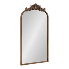 an ornate gold framed mirror on a white background with clippings to the bottom