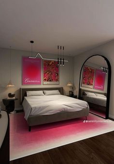 a bedroom with a bed, mirror and pink rug on the floor in front of it