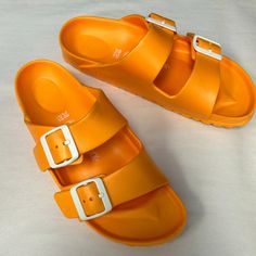 Birkenstock Orange Buclke Straps Ladies Sandals Sz Us L7 New Brand New Without Tags Flat Heel Footbed Sandals With Buckle Closure For Beach, Beach Footbed Sandals With Adjustable Strap, Casual Double Strap Sandals For Vacation, Casual Synthetic Footbed Sandals With Adjustable Strap, Casual Double Strap Footbed Sandals For Vacation, Casual Summer Jelly Sandals With Buckle Closure, Casual Summer Jelly Sandals With Buckle, Casual Adjustable Double Strap Footbed Sandals, Beach Slip-on Footbed Sandals With Buckle Closure