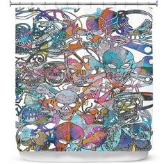 an abstract shower curtain with skulls and other things on it's side, in multi - colored colors