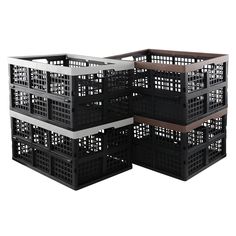 four black and white plastic crates stacked on top of each other, with the lids closed