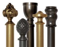 four different types of decorative finials and knobs in gold, silver, black and bronze