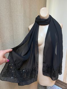 "Long elegant evening scarf for any evening event.  Measures 78\" long and 20\" wide so significantly more length and width than most scarf wraps.  Made in India. Fabric is polyester crepe with a bit of sheerness. Wide sections of square black sequins at sides. no pull or runs or missing beads." Elegant Sequin Party Shawl, Elegant Evening Shawl With Sequins, Formal Black Shawl Scarves, Black Wedding Shawl Scarf, Fitted Black Shawl For Party, Formal Fitted Black Shawl, Black Party Shawl, Scarf Wraps, Evening Scarf