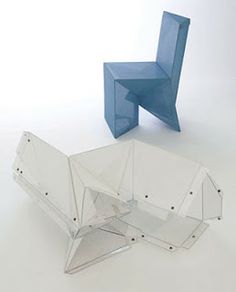 an unusual chair and table made out of plexed plastic