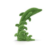 an animal made out of green grass on a white background with clipping for text